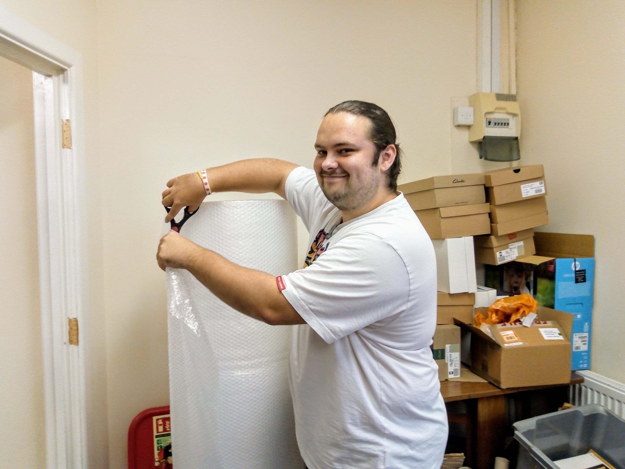 Man working with bubble wrap