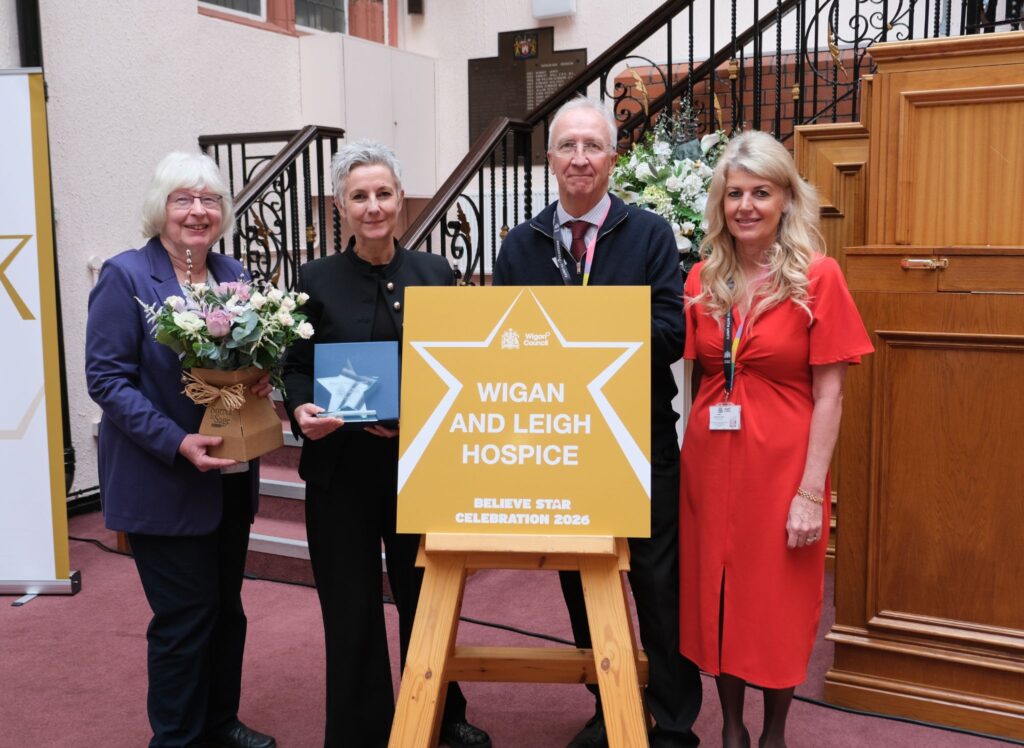 2. Shelia Fisher (Chair of Trustees of Wigan & Leigh Hospice), Jo Carby (Chief Executive of Wigan & Leigh Hospice), David Molyneux MBE (Leader of Wigan Council) and Alison McKenzie-Folan (Chief Executive of Wigan Council) stand with Wigan & Leigh Hospice's new Believe Star.
