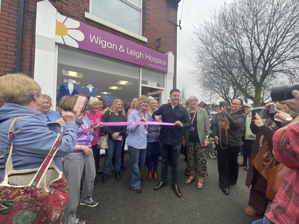 Coronation Street star Ryan Prescott opens the Wigan & Leigh Hospice charity shop in Shevington.