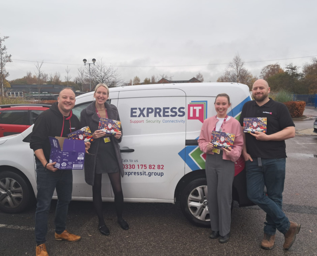 Team Hospice Supporters - Express IT donates selection boxes.